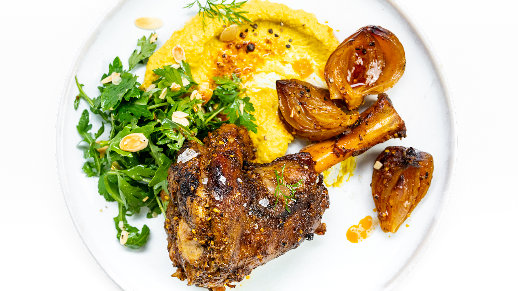 Slow Baked Spiced Lamb Shanks with Herb Salad & Spiced Hummus