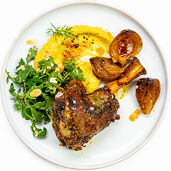 Slow Baked Spiced Lamb Shanks with Herb Salad & Spiced Hummus