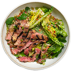 Rib Eye Steak with Crying Tiger Sauce and Sesame Baby Gem Salad