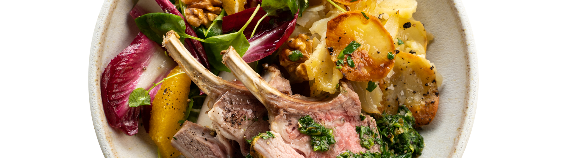 Rack of Lamb with Boulangère Potatoes & Bitter Leaf Salad